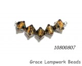 10800807 - Five Black w/Yellow Silver Foil Crystal Beads
