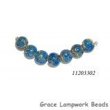 11203302 - Seven Ivory w/Blue Swirl Lentil Beads