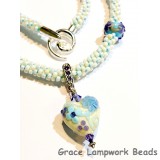 LC- Necklace with 11808305 Light Ivory w/Blue Flower Heart