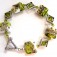 10406404 Bracelet using Lime Green w/Ivory Pillow Beads