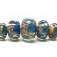 10409311 - Five Graduated Blue & Orange Rondelle Beads