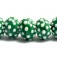 10508101 - Seven Polka Dots on Green Rondelle Beads