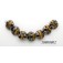 10800802 - Seven Black w/Yellow Silver Foil Lentil Beads
