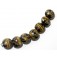 10800802 - Seven Black w/Yellow Silver Foil Lentil Beads