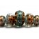 10903211 - Five Smokey Bronze Graduated Rondelle Beads