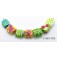 11001704 - Seven Pink/Orange/Green Tile Beads