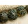 40101002 - Seven Golden Green Metallic Lentil Beads