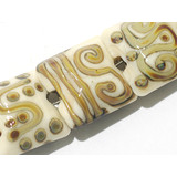 11101004 - Seven Ivory w/Beige Stringer Pillow Beads